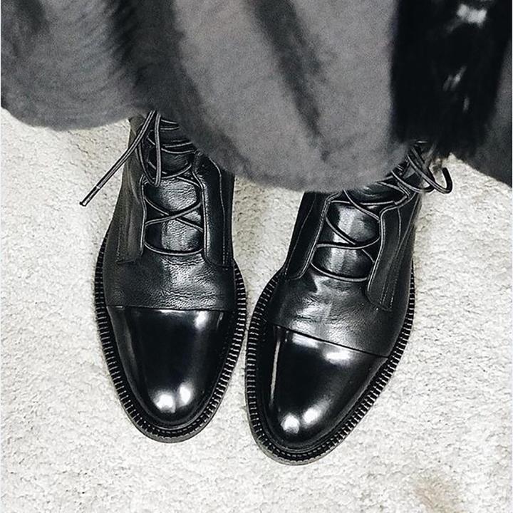 Mid-calf lace-up boots